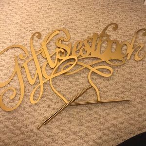 Bundle of gold “gifts” & “guestbook” signs